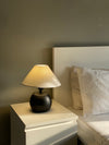 Close-up of mini orb lamp showing sleek handcrafted shape