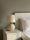 Handcrafted Mellow lamp placed on a side table
