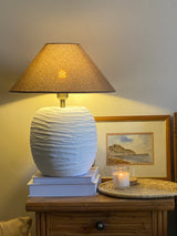 Cream terracotta lamp in Pakistan with artisan smooth surface