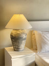 Slate terracotta lamp in Pakistan with grey and white industrial design

